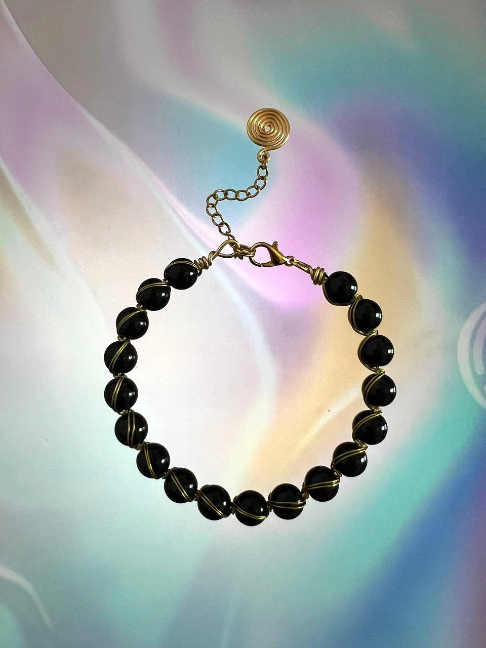 "Noir Spiral", Black Onyx & Gold Wire-Wrapped Bracelet